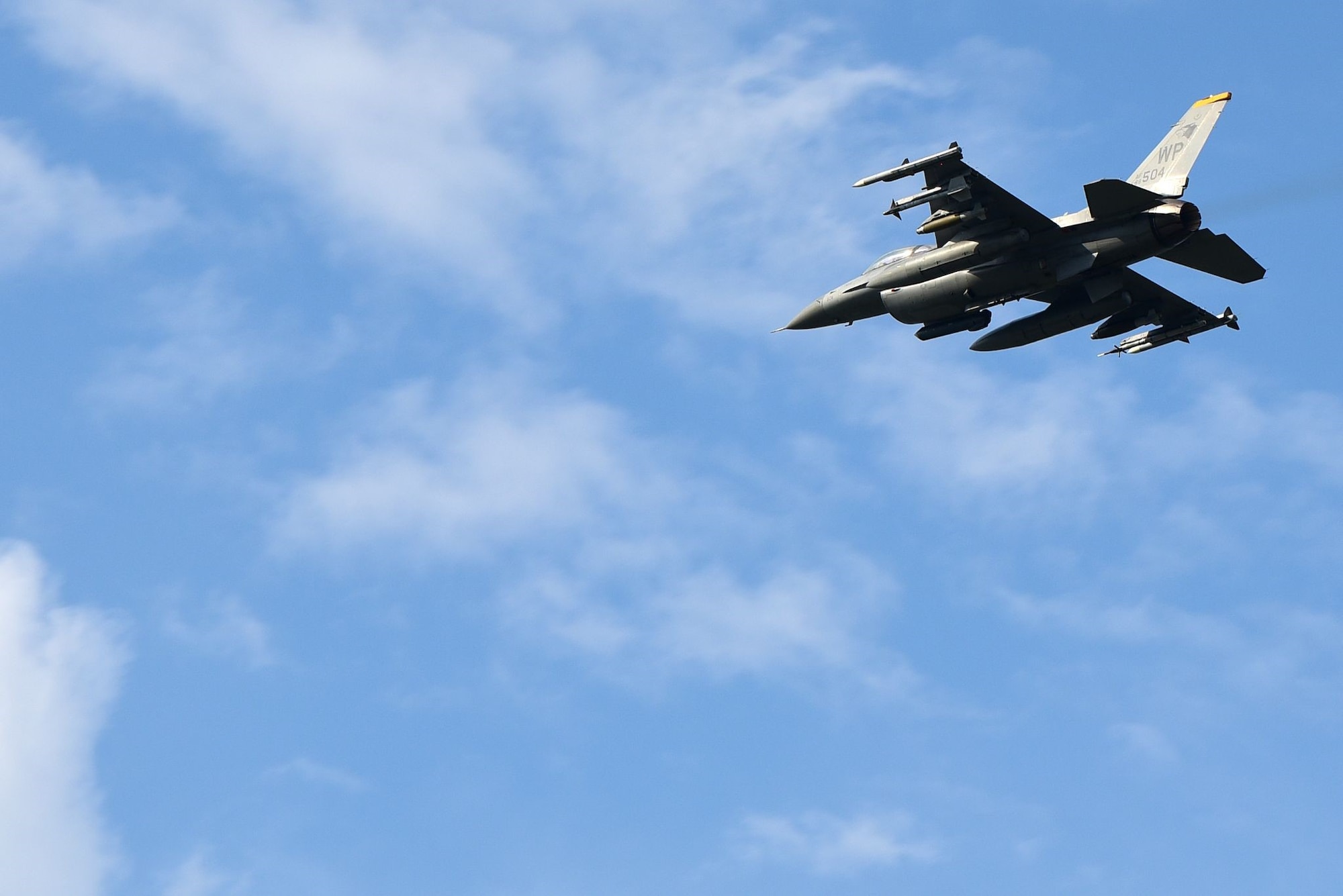 An F-16 Fighting Falcon flies over Eielson Air Force Base, Alaska during Red Flag-Alaska 21-2 at Eielson AFB, Alaska, June 17, 2021. RF-A reinforces the United States’ continued commitment to the region as a Pacific nation, leader and power. (U.S. Air Force photo by Senior Airman Suzie Plotnikov)