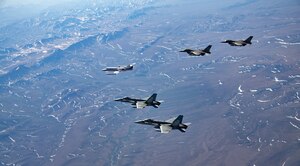 Royal Canadian Air Force CF18 Hornet and U.S. Air Force F-16 Fighting Falcon fighter jets conduct an exercise intercept of a military-contracted aircraft simulating the role of an aircraft of interest during Exercise Amalgam Dart 21-1, June 15, 2021.