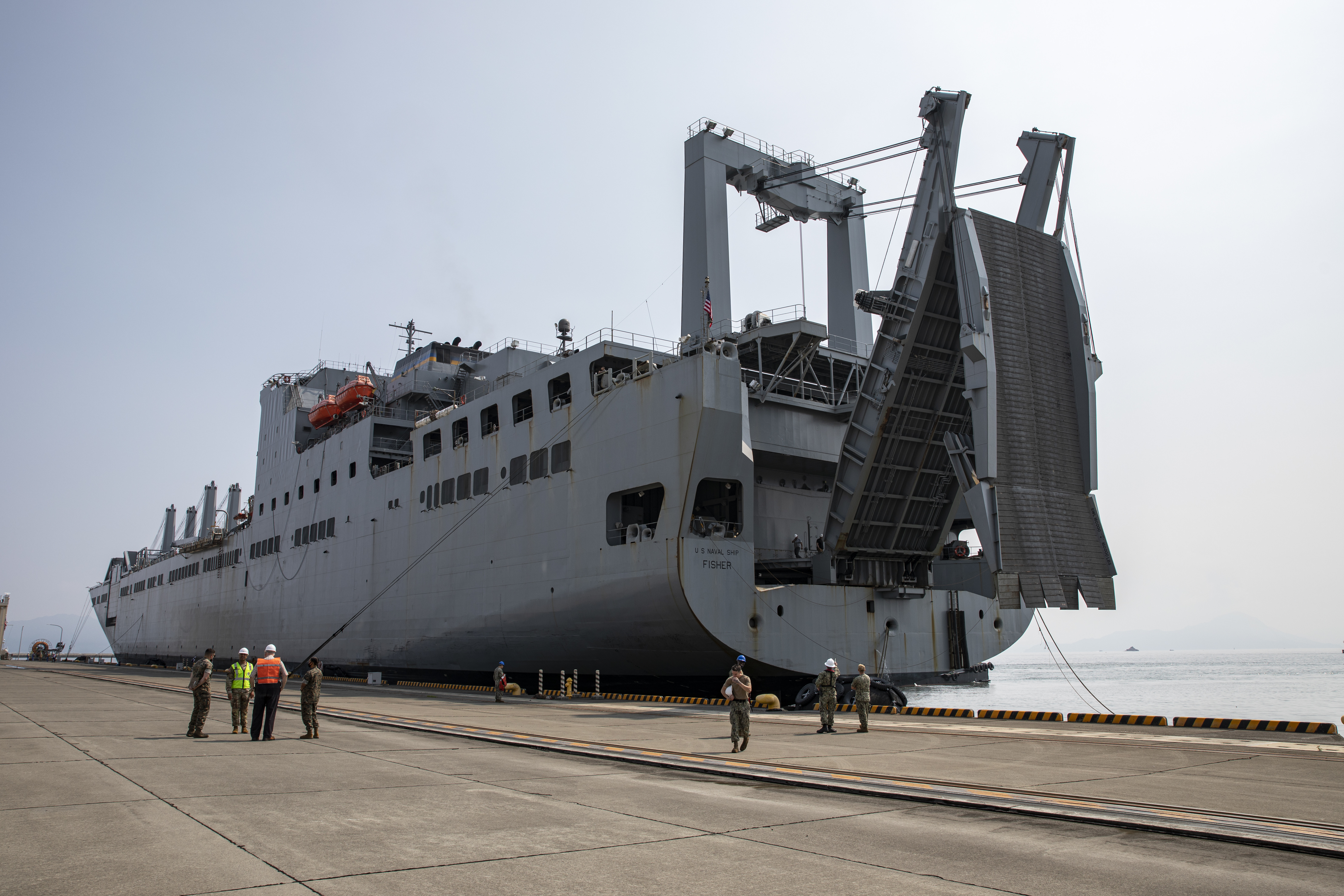 The Bob Hope-class roll on roll off vehicle cargo ship USNS Fisher (T-AKR-301) arrives at Marine Corps Air Station (MCAS) Iwakuni, Japan, June 24, 2021, as part of ORIENT SHIELD 21-2 (OS 21-2).