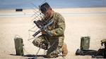 U.S. Marine with Marine Air Control Squadron 1, Marine Air Control Group 38, 3rd Marine Aircraft Wing, assembles communication device during Exercise Summer Fury 20, at Naval Air Weapons Station China Lake, California, July 31, 2020 (U.S. Marine Corps/Juan Anaya)