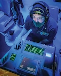 Sailor monitors subsurface contacts while standing watch in sonar control room aboard Arleigh Burke–class guided-missile destroyer USS John S. McCain during target-tracking training evolution as part of Malabar 2020, Indian Ocean, November 3, 2020 (U.S. Navy/Markus Castaneda)
