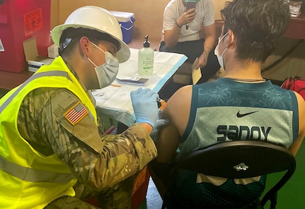 Virginia National Guard Soldiers conduct a mobile vaccination mission on board international ships in May and June 2021 in Norfolk, Virginia.