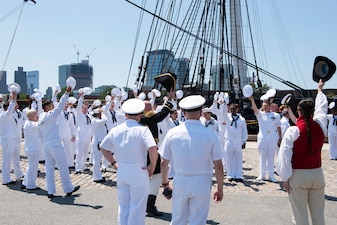 BOSTON (June 30, 2021) - Chief of Naval Operations (CNO) Adm. Mike Gilday presents the Meritorious Unit Commendation to the crew of USS Constitution. The crew earned the award for their success in adapting to virtual tours after the pandemic began in 2020. Constitution Sailors conducted tours for more than 4.5 million people and brought the Navy’s history to quarantined Americans in all 50 states and 24 other countries. (U.S. Navy Photo by Mass Communication Specialist 1st Class Raymond D. Diaz III/Released)