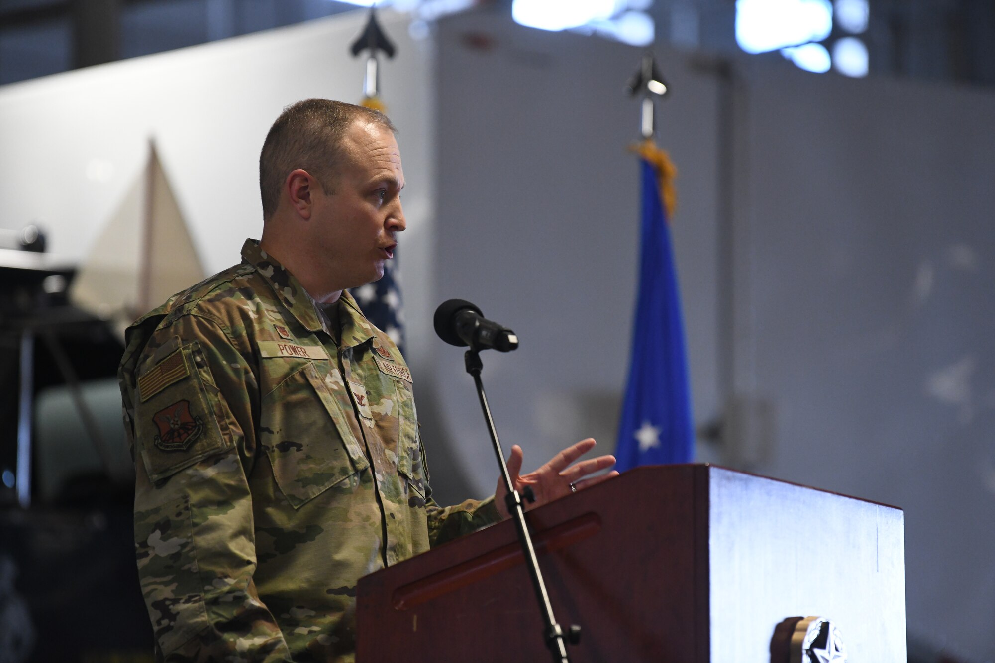 Col. Michael Power, incoming commander of the 90th Maintenance Group, speaks during the 90 MXG Change of Command Ceremony on F.E. Warren Air Force Base, Wyoming, on June 30, 2021. The change of command ceremony signifies the transition of command from Col. Brian Rico, the outgoing commander of 90 MXG, to Power. (U.S. Air Force photo by Airman 1st Class Frazier)
