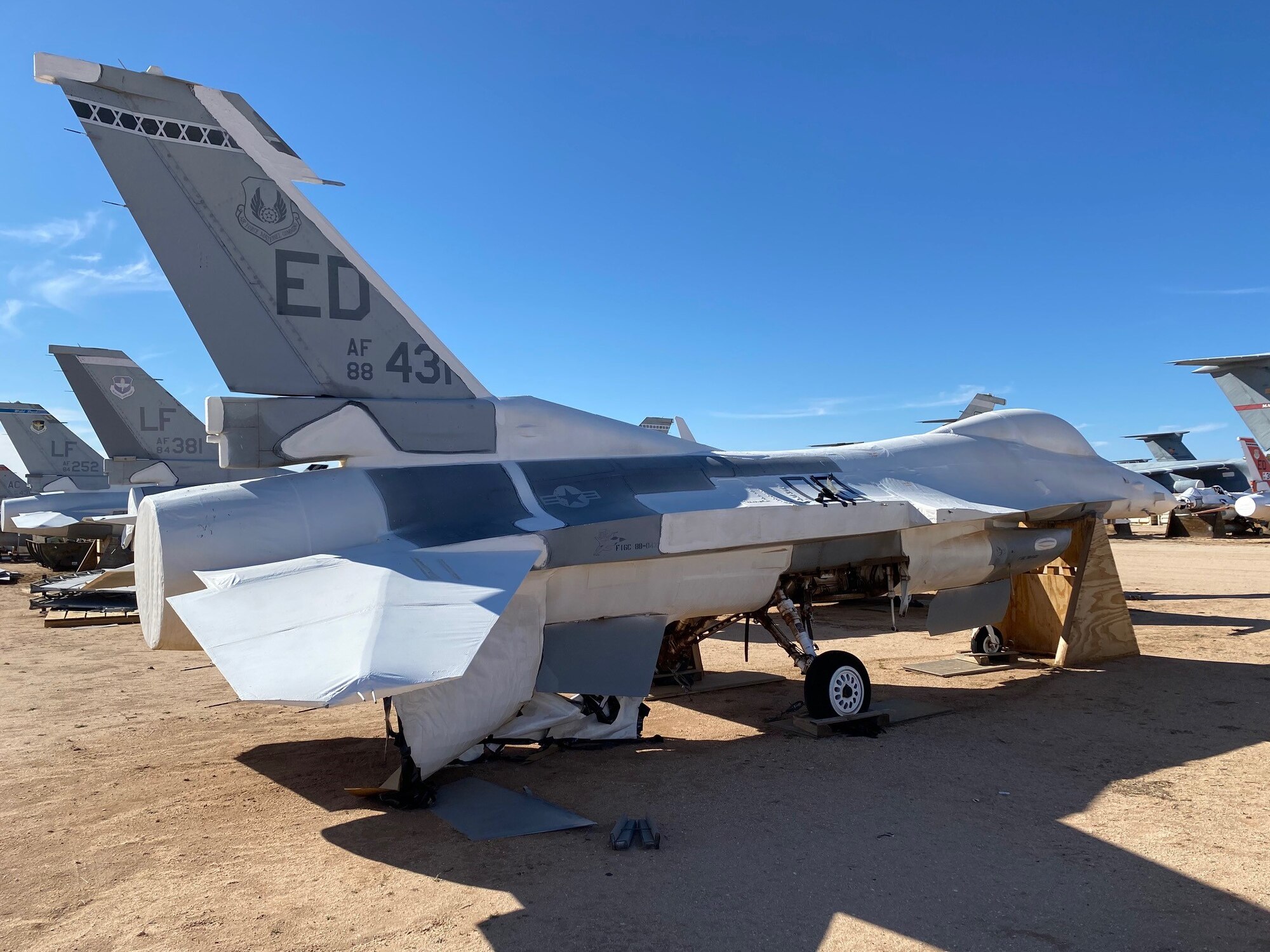 An F-16 Fighting Falcon in storage at the 309th Aerospace Maintenance and Regeneration Group (AMARG) at Davis-Monthan Air Force Base. The aircraft is one of two that will be used to create a digital replica of the fighter. (Courtesy photo)