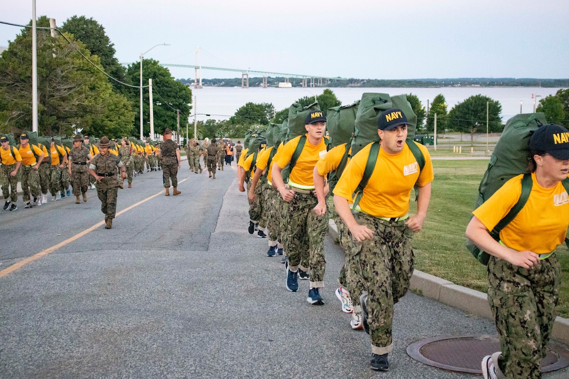 Officer Candidate School (OCS) Class 15-21 students participate in physical training at Officer Training Command Newport (OTCN), R.I., June 11.