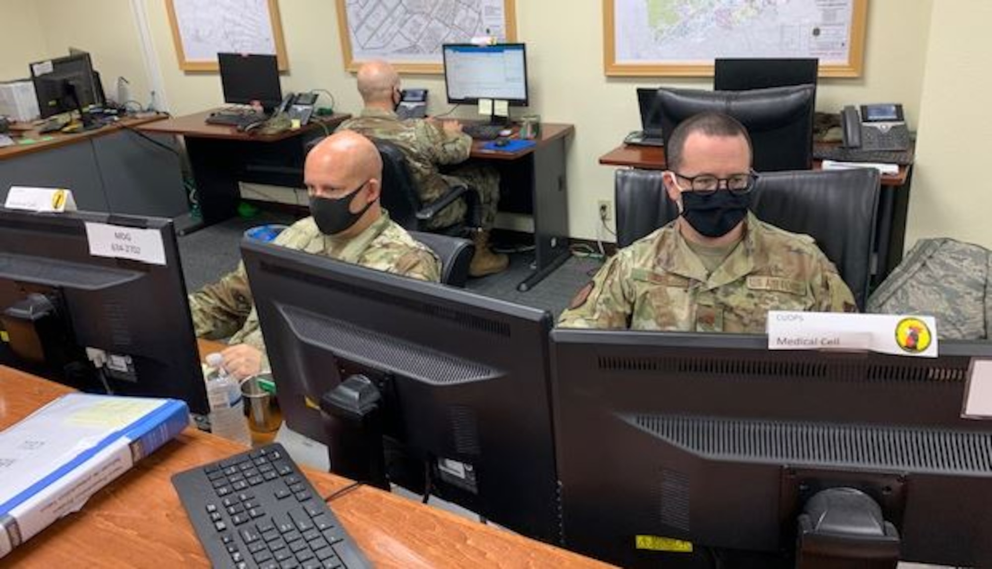 Members working and checking emails.