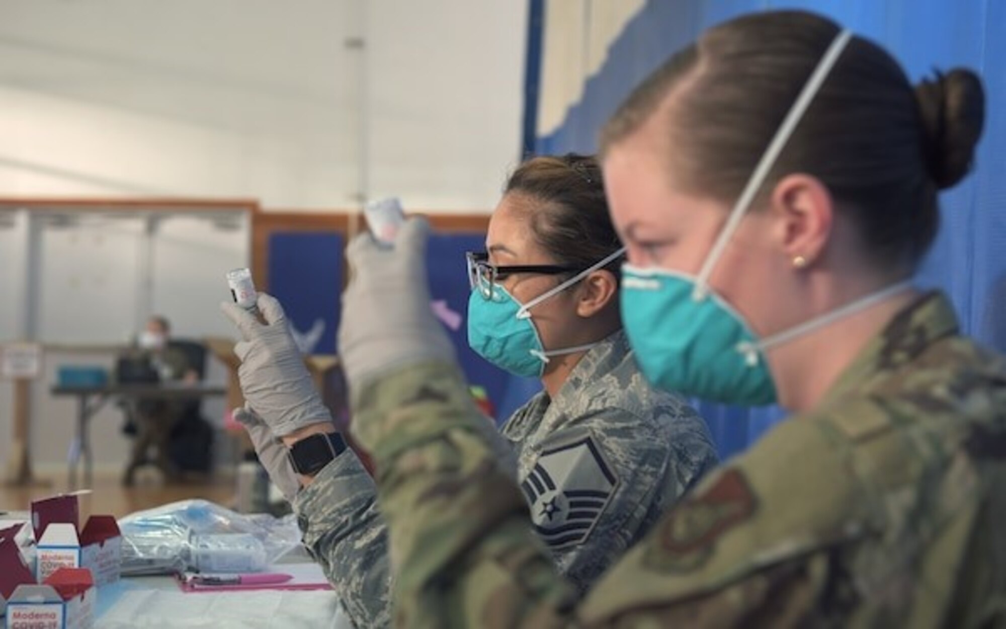 Photo of Airman receiving vaccine