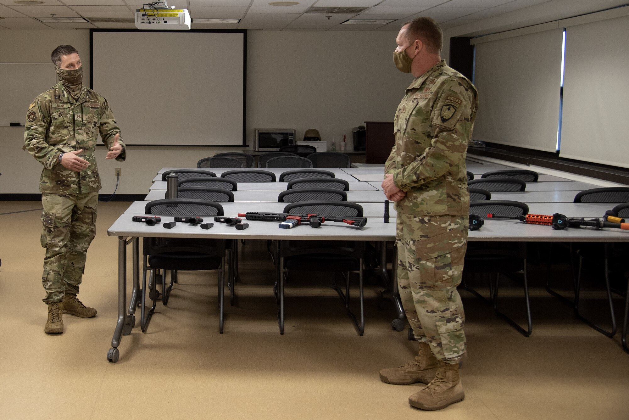 Photo of Chief France looking at the Multiple Integrated Learning Objectives Range.
