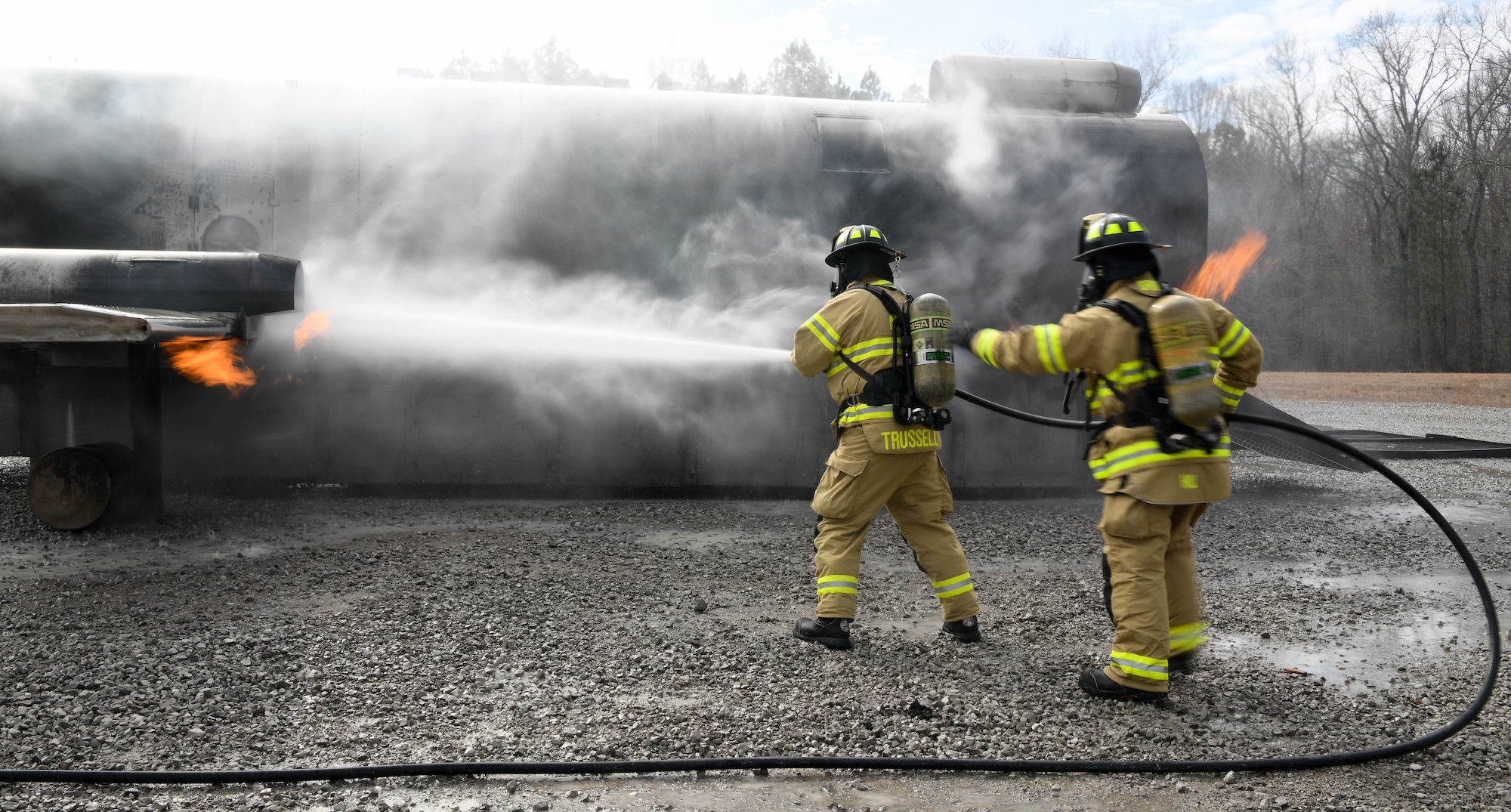 Arnold Air Force Base Fire and Emergency Services battle an engine fire as they train Feb. 10, 2021, on aircraft rescue and firefighting techniques using a propane-fueled trainer brought to the base. (U.S. Air Force photo by Jill Pickett)