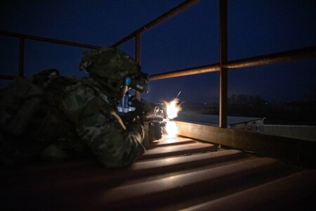 A Soldier from the 2-506, 101st Airborne Division pulls security while using the Enhanced Night Vision Goggle (ENVG-B), Nett Warrior, and Family of Weapons Sight – Individual (FWS-I) during a full mission test event a Soldier Touchpoint at Aberdeen Proving Ground, MD in February 2021.