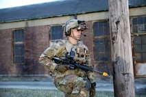 A Soldier from the 2-506, 101st Airborne Division dons the Enhanced Night Vision Goggle (ENVG-B), Nett Warrior, and Family of Weapons Sight – Individual (FWS-I) during a full mission test event at a Soldier Touchpoint at Aberdeen Proving Ground, MD in February 2021.