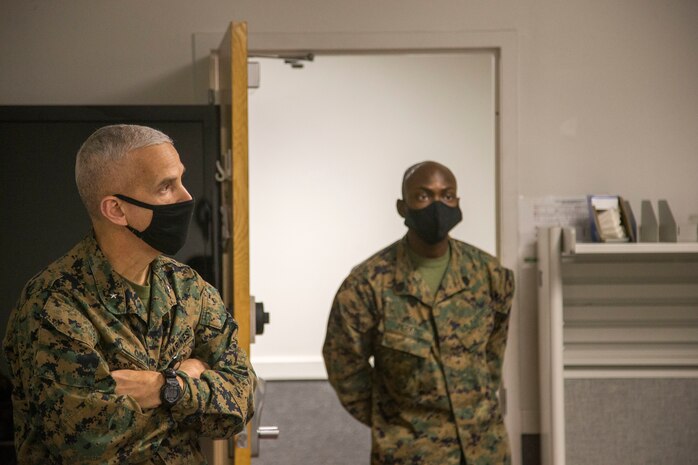 U.S. Marine Corps Brig. Gen. David L. Odom, left, deputy commanding general of II Marine Expeditionary Force speaks with Marines during a 2nd Marine Expeditionary Brigade (MEB) readiness drill at Camp Lejeune, North Carolina, Dec. 15, 2020. The readiness drill exercised the MEBs capability to deploy as a command element at a moment’s notice to crises and contingencies around the world. (U.S. Marine Corps photo by Cpl. Tanner Seims)