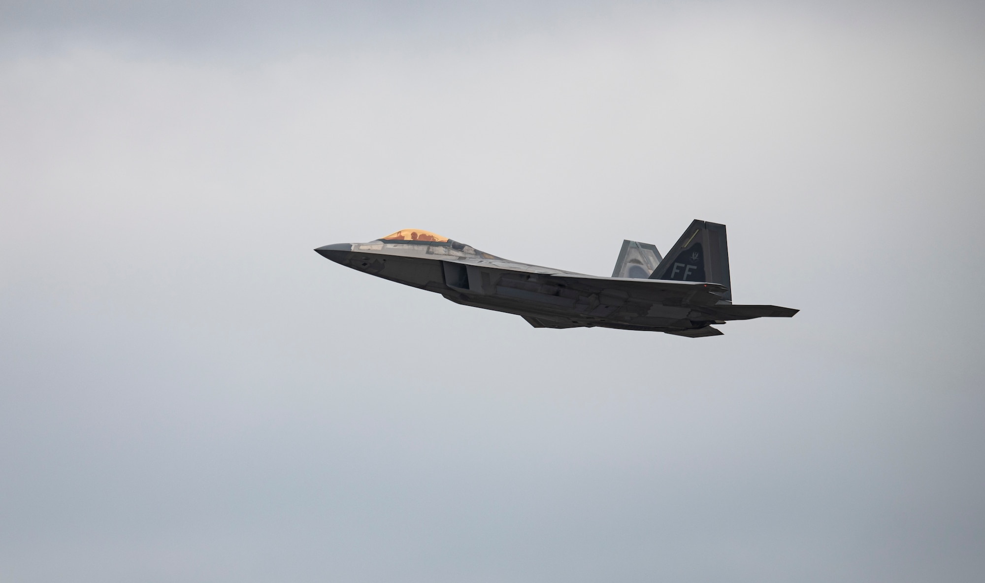 A U.S. Air Force F-22 Raptor from Joint Base Langley-Eustis, Virginia, takes off for a training flight from Tyndall Air Force Base, Florida, Feb. 19, 2021. The Weapons Systems Evaluation Program gives pilots the unique opportunity to perform live fire air-to-air exercises. (U.S. Air Force photo by Staff Sgt. Stefan Alvarez)