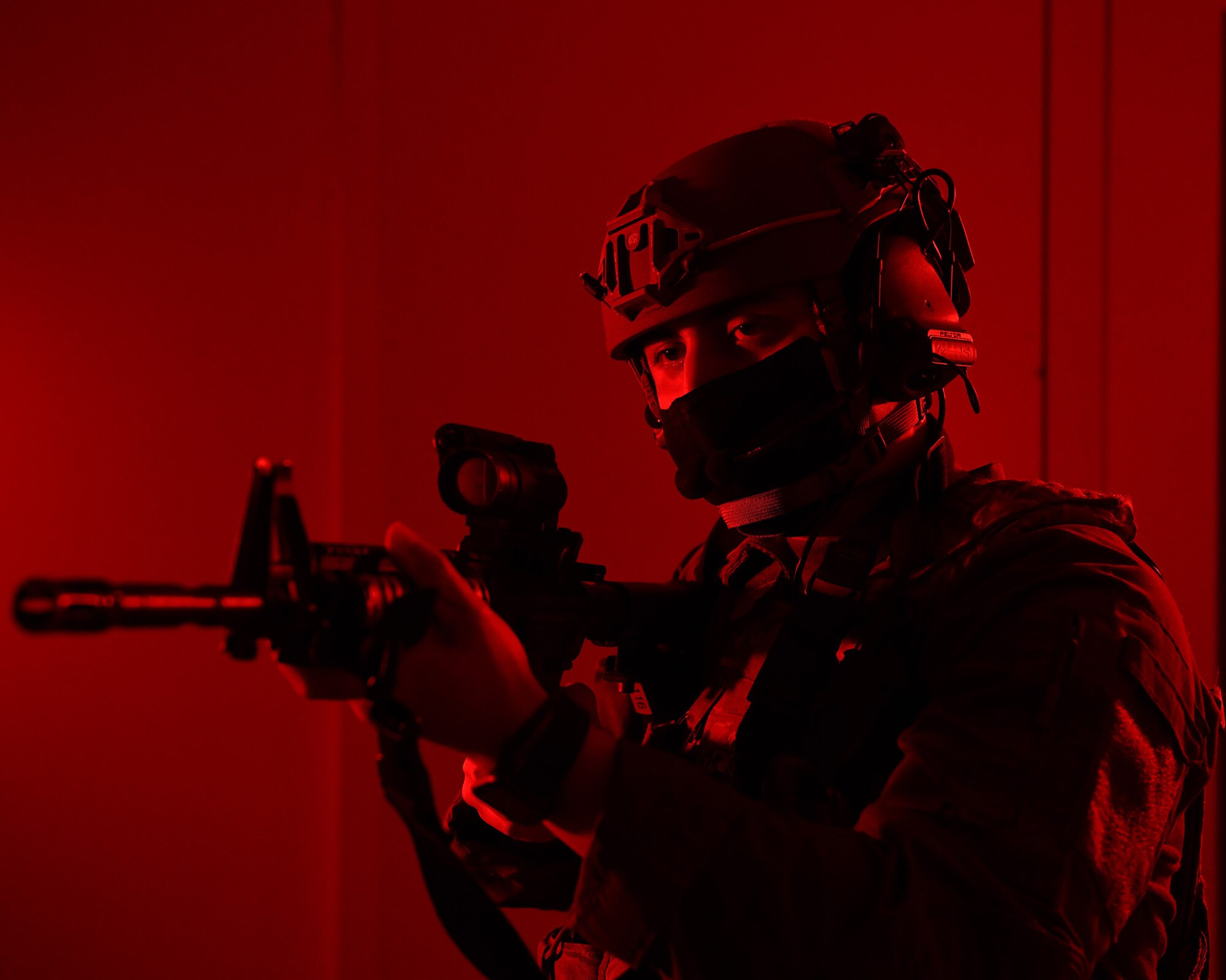 An Airman from the 460th Security Forces Squadron stands guard during an exercise at Buckley Air Force Base, Colo., Feb. 17, 2021. The 460th SFS ran through multiple scenarios in the shoot house alongside the Aurora Special Weapons and Tactic Team. (U.S. Space Force photo by Airman 1st Class Haley N. Blevins)