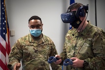 Chief Master Sgt. Chad W. Bickley, 18th Air Force command chief master sergeant, tries out a virtual reality simulation at Joint Base Charleston, S.C., Feb. 25, 2021.