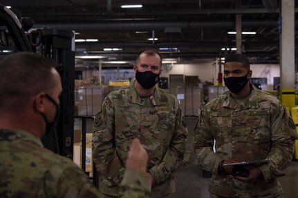 Maj. Gen. Thad Bibb., 18th Air Force commander, interacts with Airmen at Joint Base Charleston, S.C., Feb. 25, 2021.