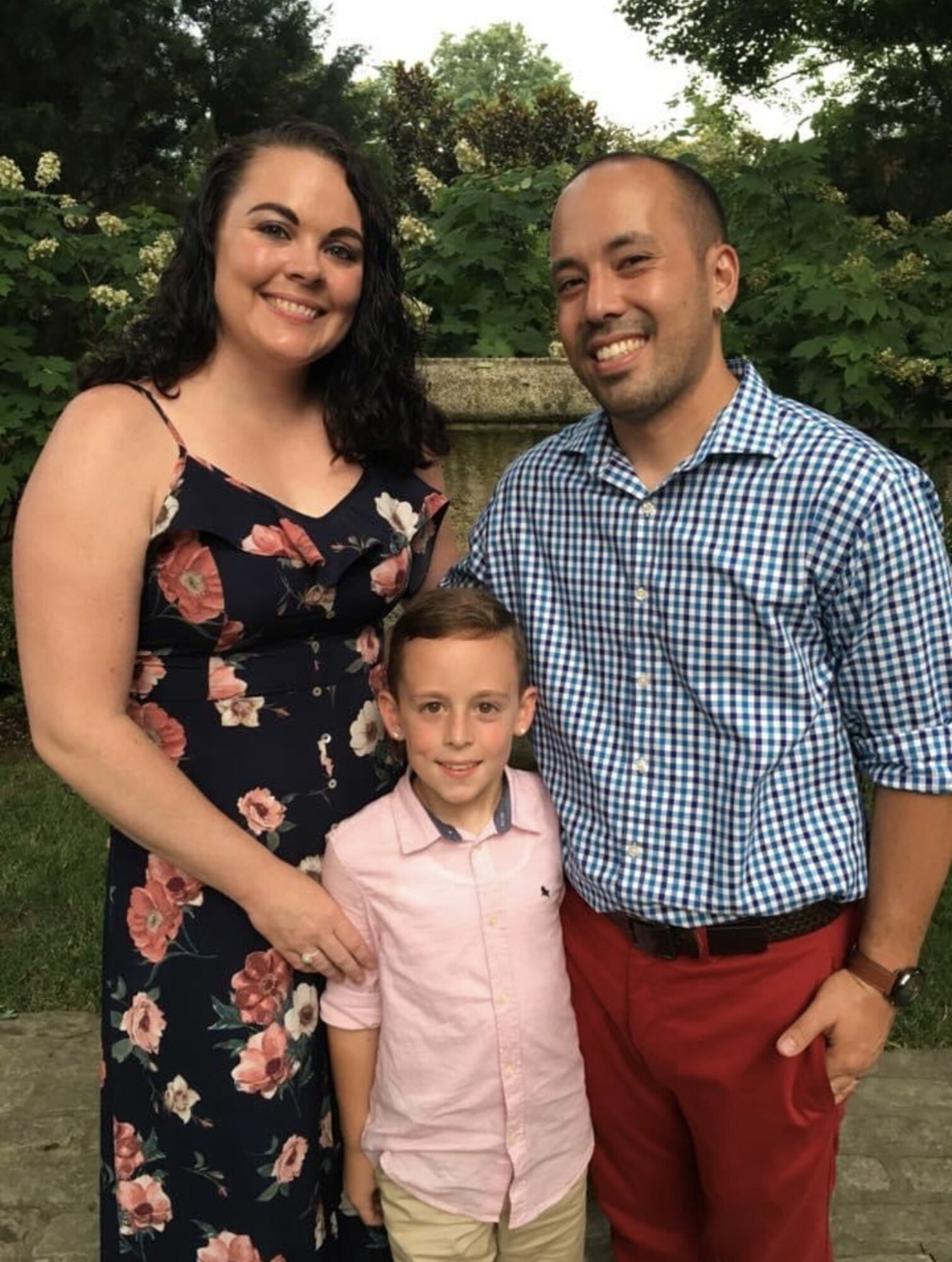 A family poses for a photo