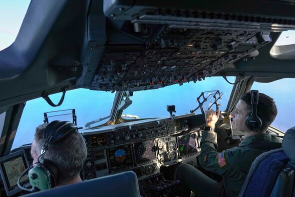 Col. Scott Berndt, 15th Wing Operations Group commander and Capt. Garrison Boone, 535th Airlift Squadron pilot, fly over the Pacific Ocean during a flight training exercise around the Hawaiian Islands, Jan. 31, 2021. The C-17 Globemaster III can perform many different flight maneuvers including tactical airlift and airdrop missions. (Air Force photo by Airman 1st Class Makensie Cooper)