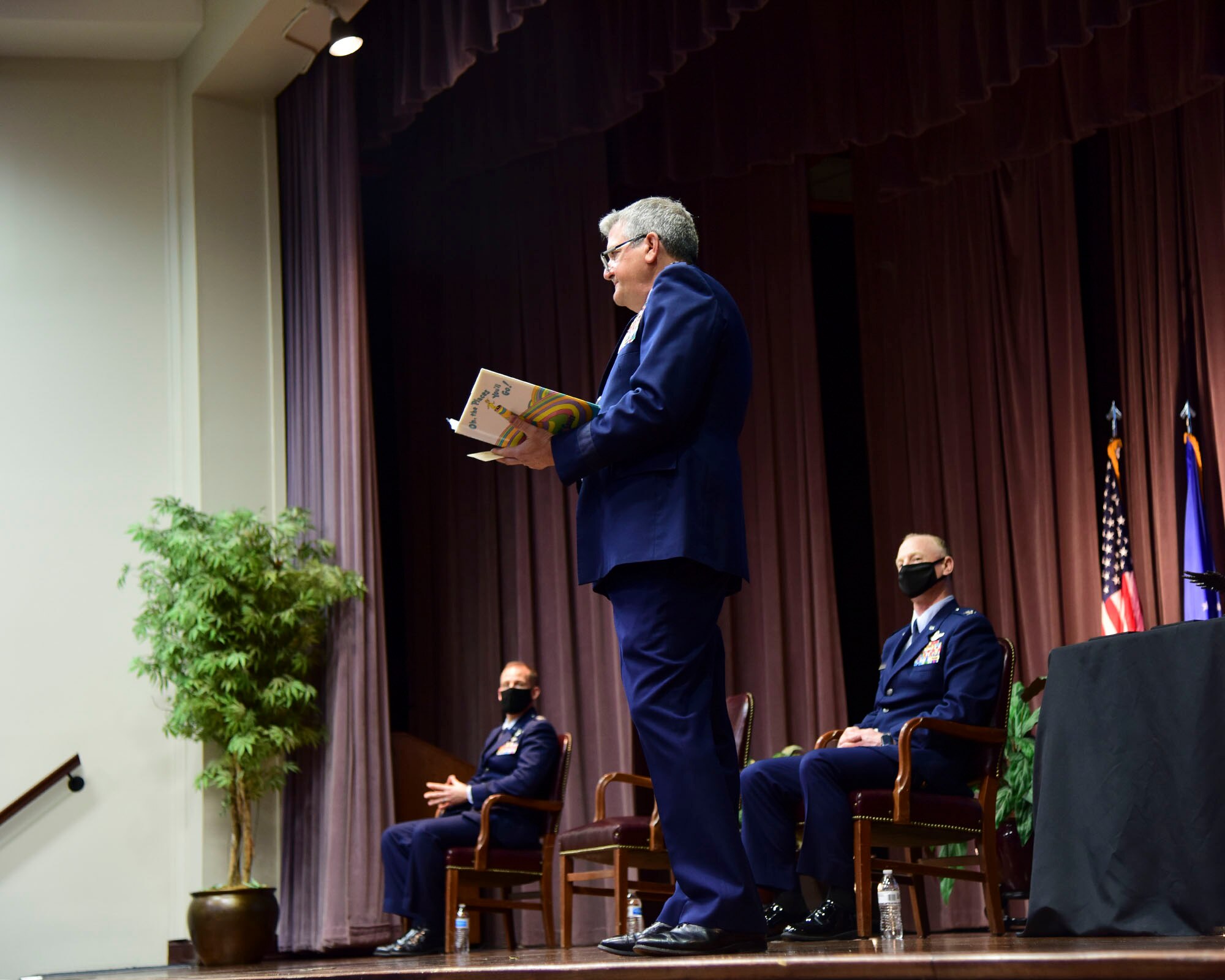 Retired U.S Air Force Lt. Gen. Vern Findley II, former Air Mobility Command, Scott Air Force Base, Ill., vice commander from 2008-2011, reads an excerpt from Dr. Seuss’ children’s story book ‘Oh the Places You’ll Go’, during the graduation of class 21-06, Feb. 26, 2021, on Columbus Air Force Base, Miss. In compliance with COVID-19 guidelines all attendees maintained 6-feet distancing and mask were mandated. (U.S. Air Force photo by Melissa Duncan-Doublin)