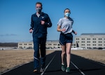 Air Force Uniform Office members 1st Lt. Avery Thomson and 2nd Lt. Maverick Wilhite put updated versions of the Air Force physical training (PT) uniform through their paces at Wright-Patterson Air Force Base, Ohio, Feb. 25, 2021.  The Air Force Uniform Office is part of the Human System's Division in the Air Force Life Cycle Management Center's Agile Combat Support Directorate. This is the first update to the PT uniform in more than 16 years, and over 150 Airmen participated in testing the new gear. The new ensemble currently consists of a jacket, a pair of pants, a T-shirt and two types of shorts; a lined runner's short and a longer unlined multipurpose short. A long sleeve t-shirt and a hoodie are in development. The ensemble features improved fabrics that are softer and quick drying, and have antimicrobial technology, which helps with moisture and odor control. The new uniform items are entering the production phase and will be available to Airmen sometime in 2022. (U.S. Air Force photo by Jim Varhegyi)