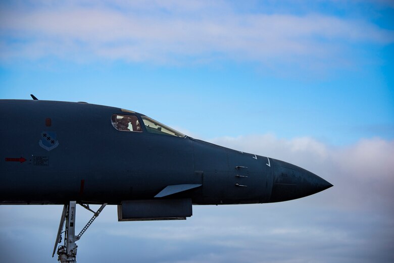 Aircrew assigned to the 9th Expeditionary Bomb Squadron perform pre-flight checks inside of the cockpit of a B-1B Lancer at Ørland Air Force Station, Norway, Feb. 26, 2021. Conducting Bomber Task Force Europe missions allows the 9th EBS to conduct ally and partner integration training while providing theater familiarization to B-1 aircrew. (U.S. Air Force photo by Airman 1st Class Colin Hollowell)