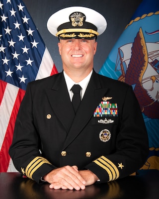 Official biography photo of Commander Thomas Butts, CO, HSC-25.