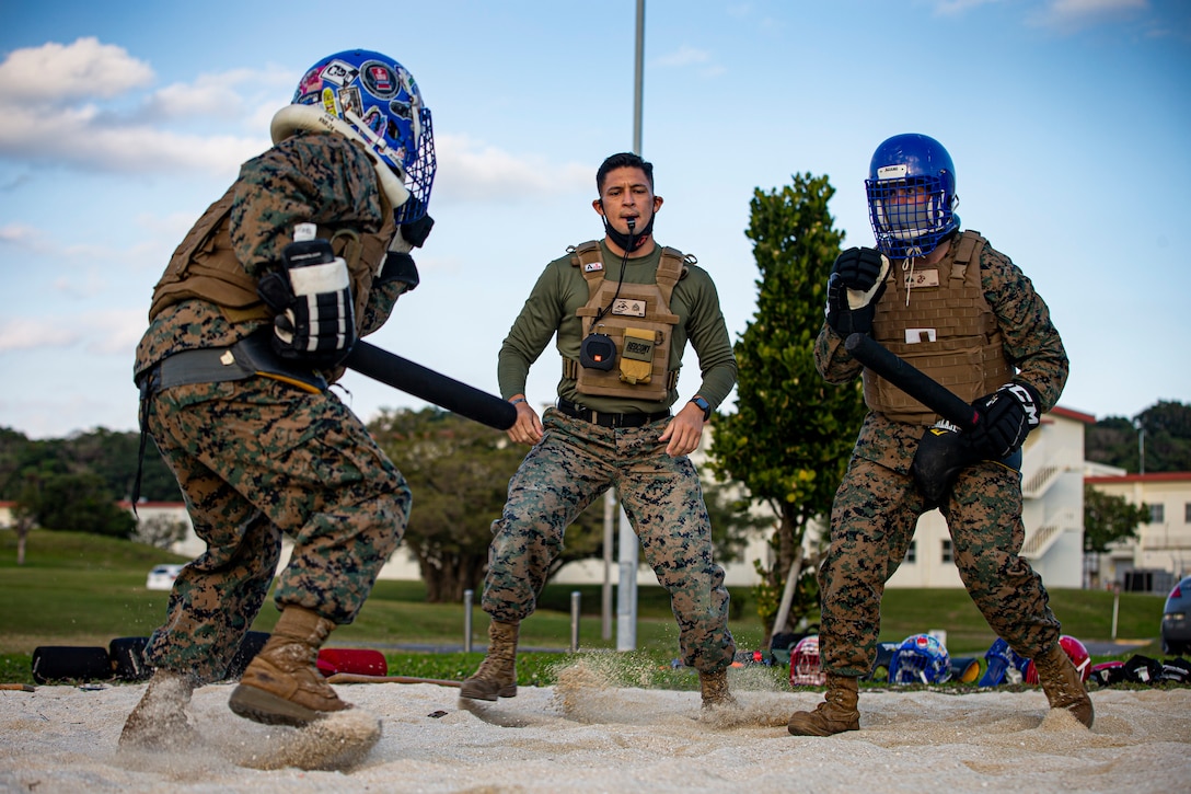 U.S. Marine Corps Sgt. Avery Luengo, the platoon sergeant for G-6 Customer Service Branch, conducts weapons of opportunity engagement during a Marine Corps Martial Arts Program course on Camp Foster, Okinawa, Japan, Feb. 4, 2020. Luengo remains proactive with his Marines and his own duties by being a force multiplier and exceeding the standard of a noncommissioned officer by earning several awards and certifications through various demanding billets. Luengo is a native of Reynosa, Mexico, and McAllen, Texas. (U.S. Marine Corps photo by Cpl. Karis Mattingly)