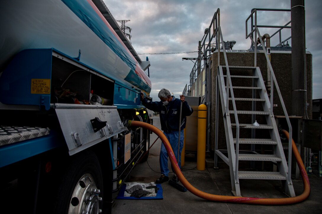 A member of the U.S. military community fuels up his truck at a defense fuel supply point (DFSP) on Camp Foster, Okinawa, Japan, Jan. 14, 2021. A DFSP on Okinawa allows III Marine Expeditionary Force to stay ready at a moment’s notice. Bulk fuel supports all types of transportation fuel for the variety of U.S. military vehicles on Okinawa. (U.S. Marine Corps photo by Lance Cpl. Shelby A. Karr)