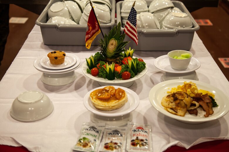 U.S. Marines with Headquarters and Support Battalion, Marine Corps Installations Pacific, Marine Corps Base Camp Smedley D. Butler, converse during the Commanding Officer and Sergeant Major breakfast in Camp Foster’s Chow Hall on Jan. 5, 2021. Col. Jeffrey L. Hammond Commanding Officer, and Sgt.Maj. Brian R. Drechsler Sergeant Major, of Headquarters and Support Battalion has come together for breakfast every Tuesday for the last six months to provide guidance to Marines.