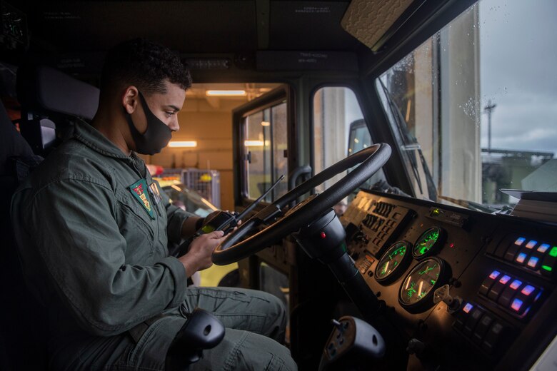 U.S. Marine Corps Cpl. Terrell Batchelor, an expeditionary firefighting and rescue specialist with Headquarters and Support Battalion, completes a vehicle assessment during a rapid response drill at Marine Corps Air Station Futenma, Okinawa, Japan, Jan. 7, 2020. The drill is designed to make Marines faster and more efficient at responding to emergencies.