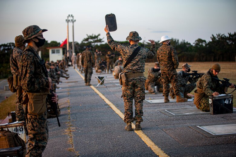 U.S. Marines with Marine Corps Installation Pacific- Camp Smedley D. Butler, participate in the annual rifle qualification on Camp Schwab, Okinawa, Japan, Feb. 2, 2020. Once a year, Marines are required to shoot on the known distance course of fire, tables one and two. Upon completion, Marines are awarded a score of marksmanship, sharpshooter or expert. (U.S. Marine Corps photo by Cpl. Karis Mattingly)