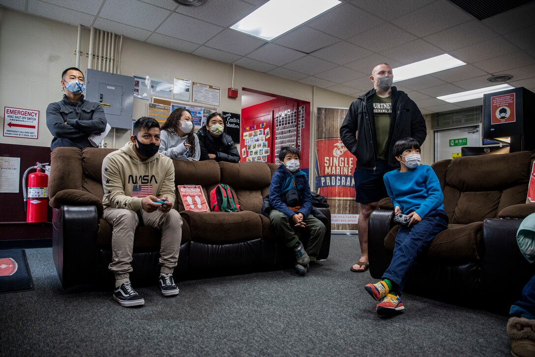 Volunteers with Single Marines Program (SMP) play games after an Uruma City clean up at Camp Courtney, Okinawa, Japan, Jan. 9, 2021. Camp Courtney SMP hosted their first clean up of the year which allowed volunteers to give back to the community and strength local relations. (U.S. Marine Corps photo by Lance Cpl. Zachary Larsen)