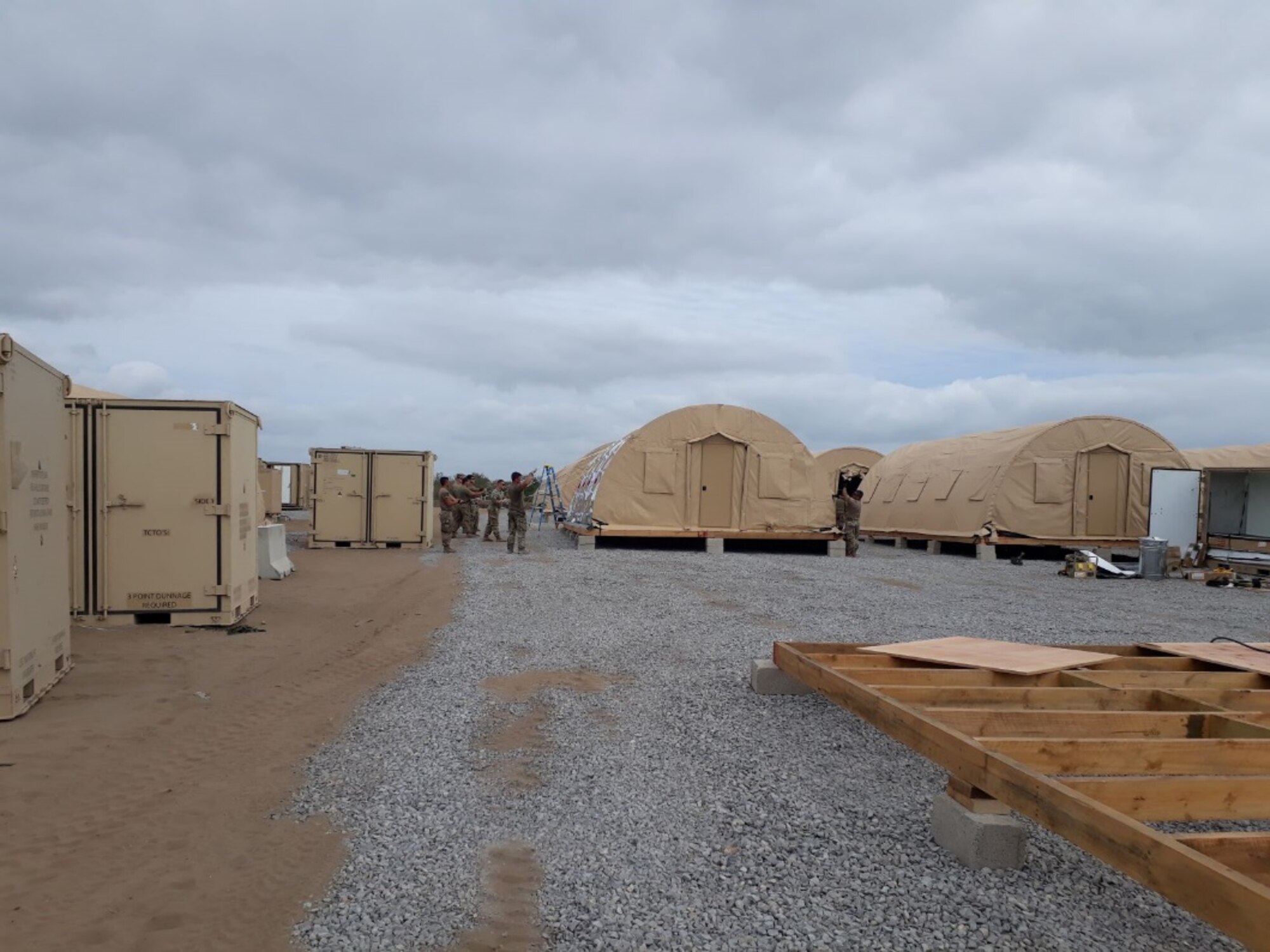 Airmen from the 435th Air Ground Operations Wing and 435th Air Expeditionary Wing execute a short-notice tasker to build-out a base capability in East Africa, Dec. 20, 2020. In addition to the build-out, consolidations and renovations of numerous existing structures were completed to support additional workspaces. (Courtesy photo)