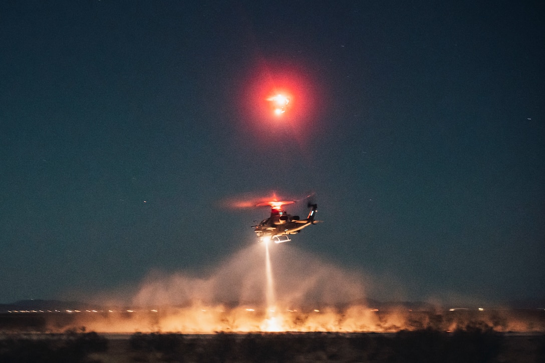 U.S. Marine Corps AH-1Z Vipers take off from a forward arming and refueling point during Realistic Urban Training exercise at Gila Bend, Arizona, Feb. 25.