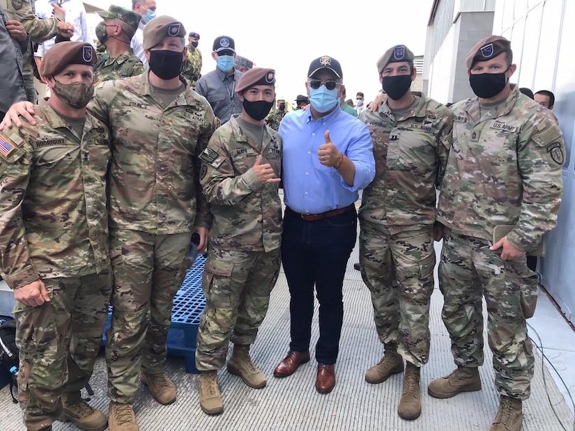 From left to right, 1st Security Force Assistance Brigade Logistics Advisors 1st Sgt. Francisco Rodriguez and Maj. Travis Coley, 1SFAB Maneuver Advisor Maj. Cameron Mays, Colombian President Ivan Duque, 1SFAB Operations Advisor Capt. Kris Farrar and 1SFAB CONAT Lead Advisor Master Sgt. David Francis, meet following the activation ceremony for the newest Colombian Counter Narcotics Trans-National Threats Division, CONAT, at the request of the unit’s commander Brig. Gen. Juan Correa in Tolemaida, Colombia, Feb. 26. Colombian President Dr. Ivan Duque Marquez officiated the ceremony and subsequently met with the advisors to discuss ongoing partnership initiatives and future opportunities.