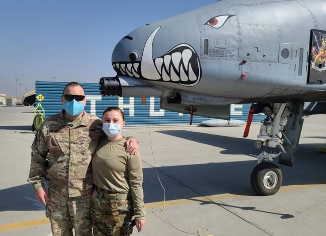 A green and blue family reunion: Army father's brief meet-up with Air Force daughter in Afghanistan