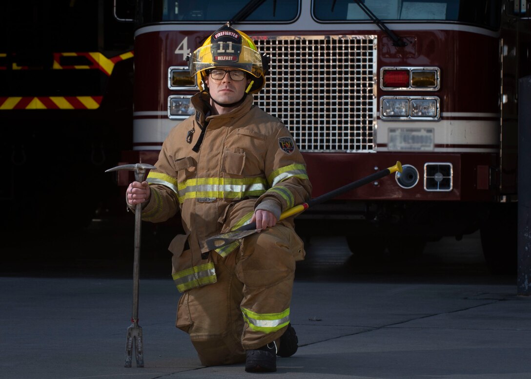 Senior Airman Derrick Radzieski, 4th Component Maintenance Squadron aerospace propulsion technician, carries firefighter tools at Seymour Johnson Air Force Base, North Carolina, Feb. 24, 2021.