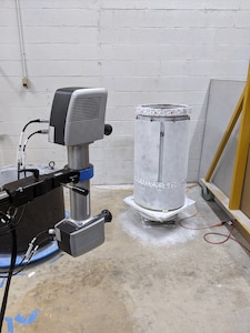 The scanner and a shaft with just the tapered end for testing with the Shaft Taper Analysis Verification Evaluation (STAVE) System.