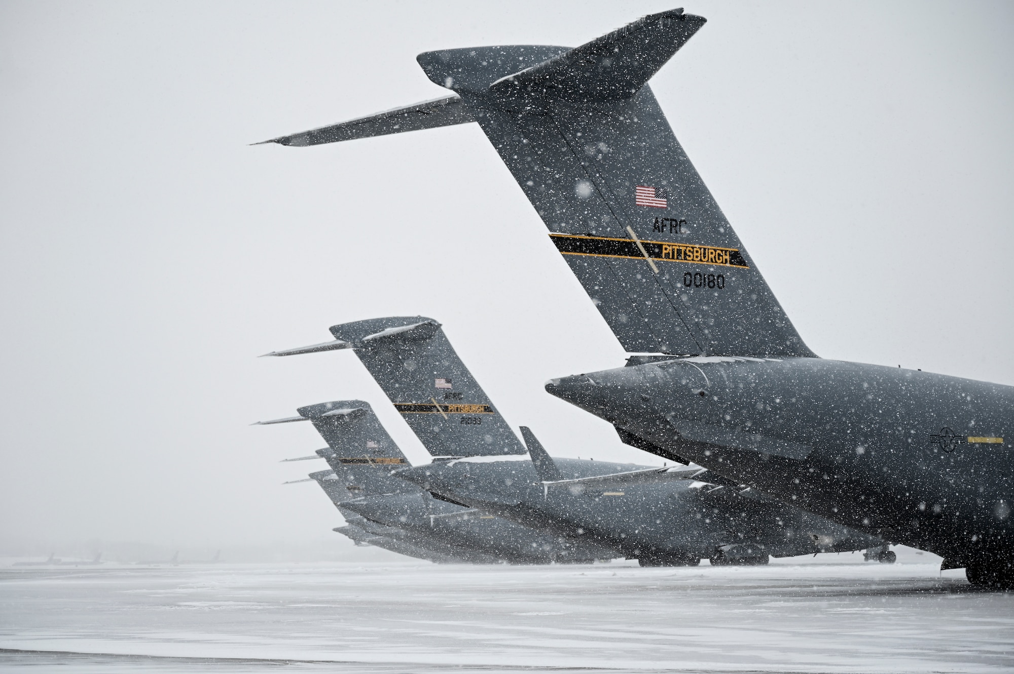 C-17 Globemaster III aircraft assigned to the 911th Airlift Wing sit on the flight line at the Pittsburgh International Airport Air Reserve Station, Pennsylvania, Feb. 16, 2021.