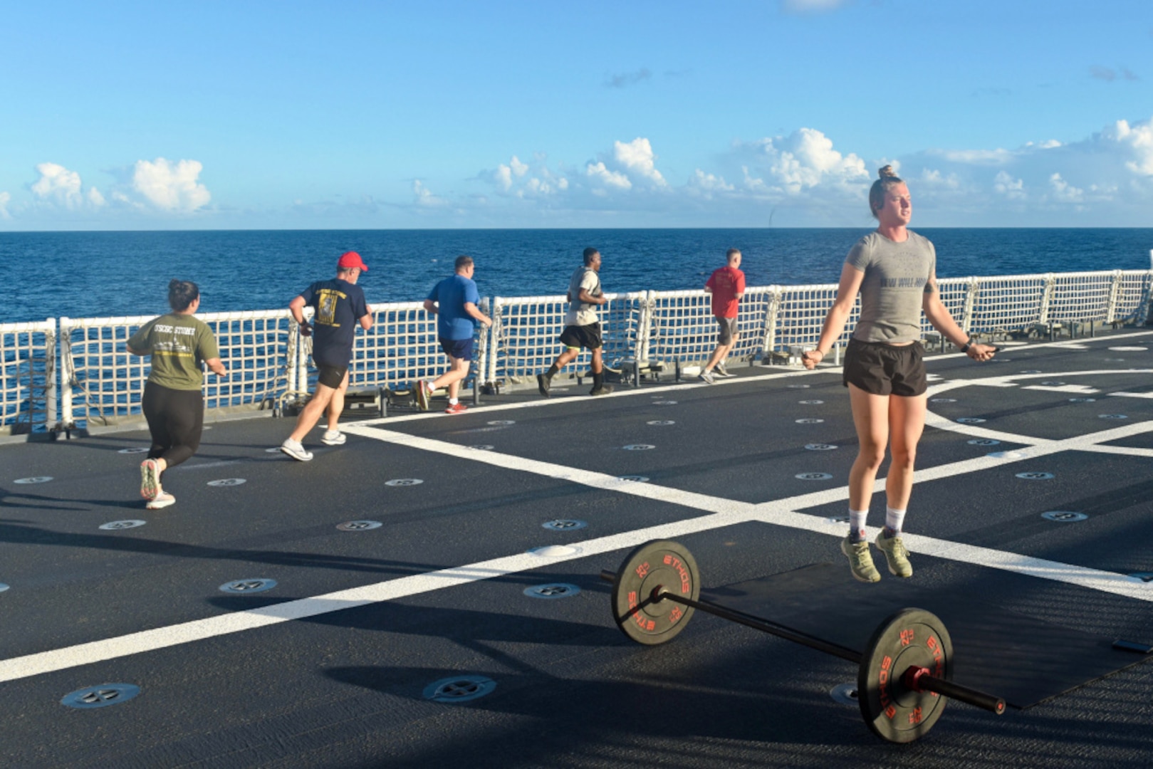Members of the USCGC Stone (WMSL 758) conduct a regular workout while at sea in the South Atlantic on Jan. 19, 2021. Maintaining physical fitness is key to performing operations safely. (U.S. Coast Guard photo by Petty Officer 3rd Class John Hightower)