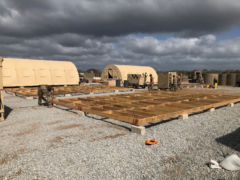 Airmen from the 435th Air Ground Operations Wing and 435th Air Expeditionary Wing execute a short-notice tasker to build-out a base capability in East Africa, Dec. 29, 2020. The Airmen renovated and developed a 3,000 square foot building to consolidate the Base Defense Operations Center, 475th Expeditionary Air Base Squadron Staff and the U.S. Army's Task Force Bayonet security forces into a single joint facility.