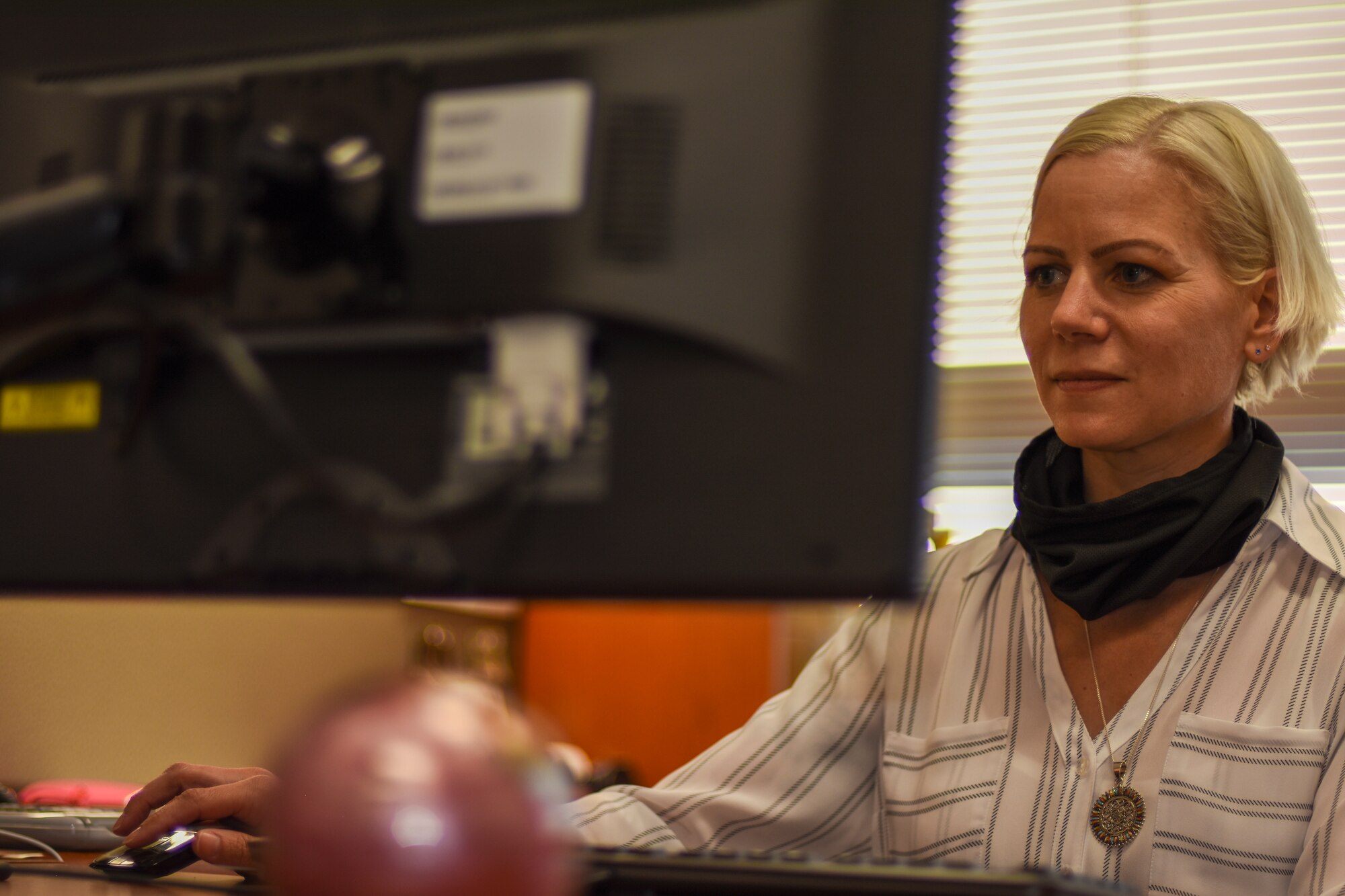 Shallyn Troutman in her office, improving a process.