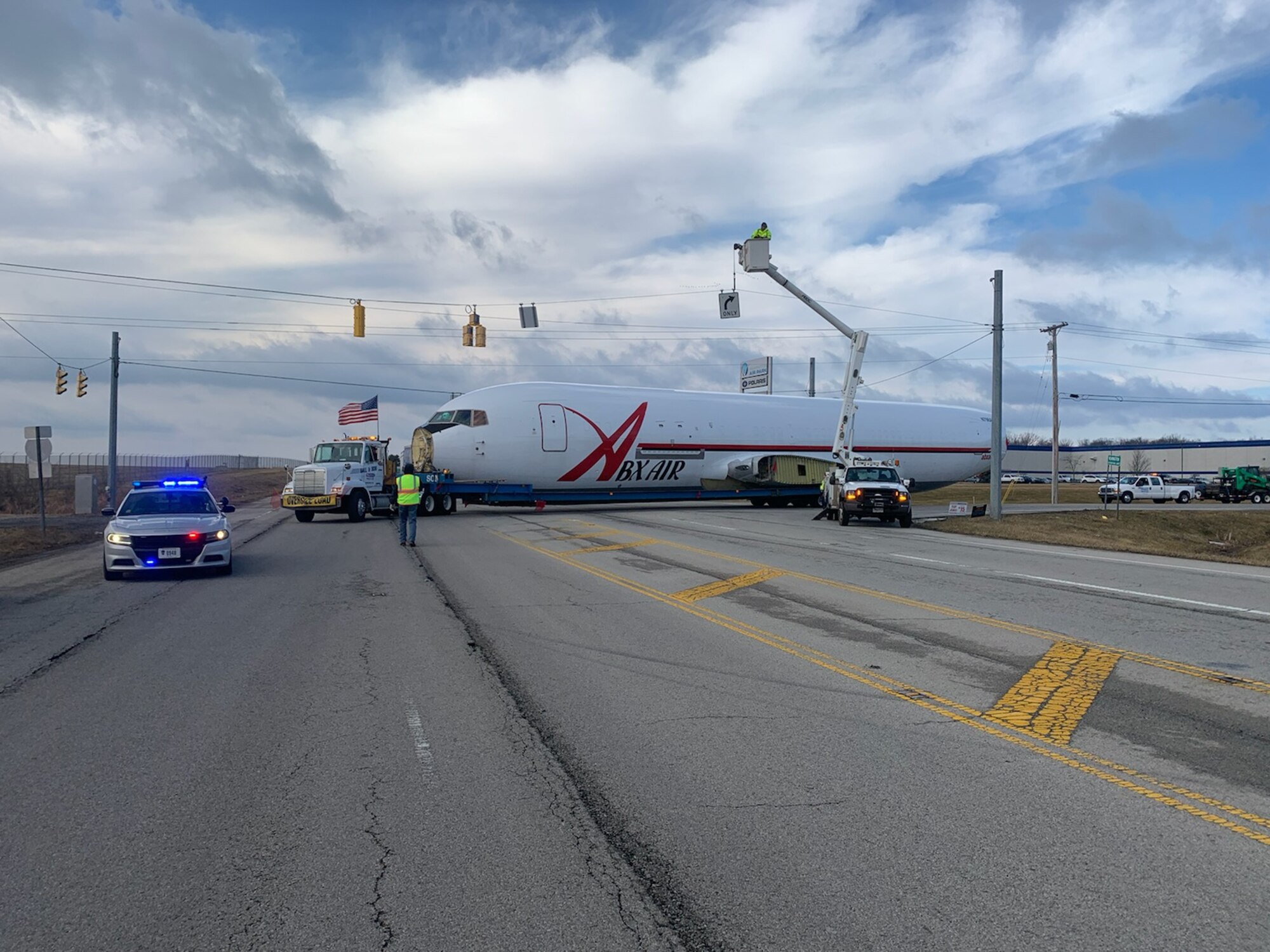 On the back of a tractor trailer, the fuselage of a Boeing 767 leaves Wilmington Air Park in Wilmington, Ohio, en route to the U.S. Air Force School of Aerospace Medicine at Wright-Patterson Air Force Base. After its three-day journey through Greene and Montgomery counties, this fuselage will join the cadre of seven other fuselages, all used for aeromedical evacuation training at USAFSAM, part of the Air Force Research Laboratory’s 711th Human Performance Wing. (U.S. Air Force courtesy photo)