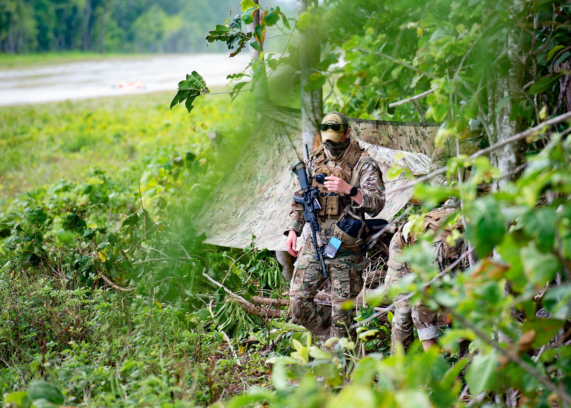 A 736th Security Forces Airman walks away from a defensive fighting position (DFP) during Cope North 21, Feb. 10, 2021, on Angaur, Palau.