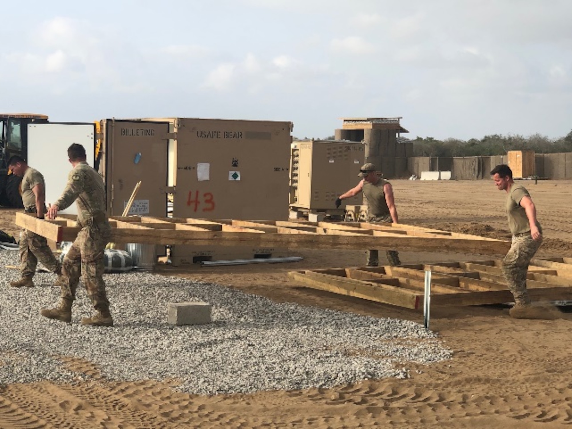 Airmen from the 435th Air Ground Operations Wing and 435th Air Expeditionary Wing execute a short-notice tasker to build-out a base capability in East Africa, Dec. 29, 2020. The teams assigned to the 435th AGOW and 435th AEW successfully executed their short-notice order as one team enabling multi-theater sustainment and support while maintaining partner capacity. (Courtesy photo)