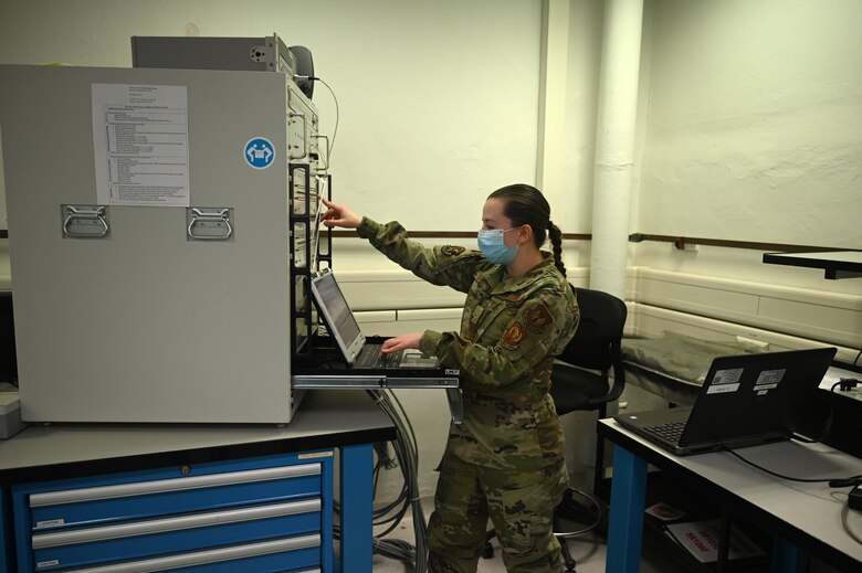 U.S. Air Force Airman 1st Class Mariia Shevchenko, 86th Maintenance Squadron precision measurement equipment laboratory apprentice, runs calibration testing on a laptop at a PMEL facility