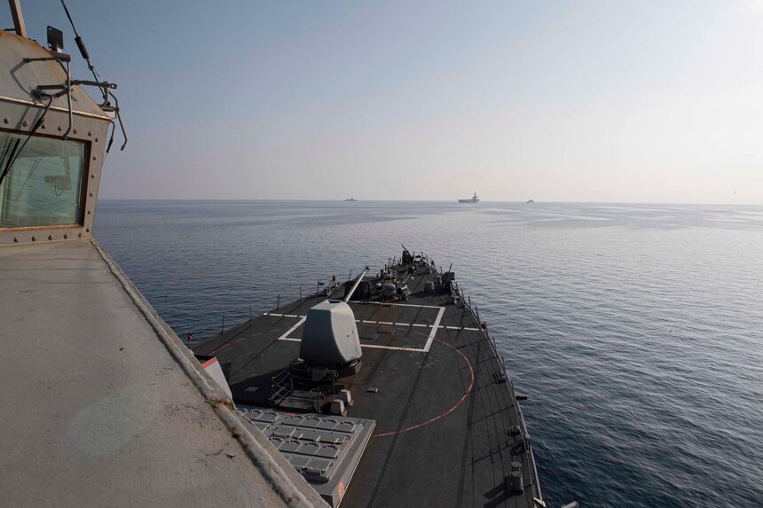 210228-N-RG171-0207 MEDITERRANEAN SEA (Feb. 28, 2021) The French navy nuclear-powered aircraft carrier, FS Charles De Gaulle (R 91), middle, the Belgian navy frigate BNS Leopold (F 930), left, and the Greek navy frigate HS Kanaris (F 464) sail in front of the Arleigh Burke-class guided-missile destroyer USS Donald Cook (DDG 75), during a photo exercise, Feb. 28, 2021. Donald Cook, forward-deployed to Rota, Spain, is on patrol in the U.S. Sixth Fleet area of operations in support of regional allies and partners and U.S. national security in Europe and Africa. (U.S. Navy photo by Mass Communication Specialist 3rd Class Will Hardy/Released)