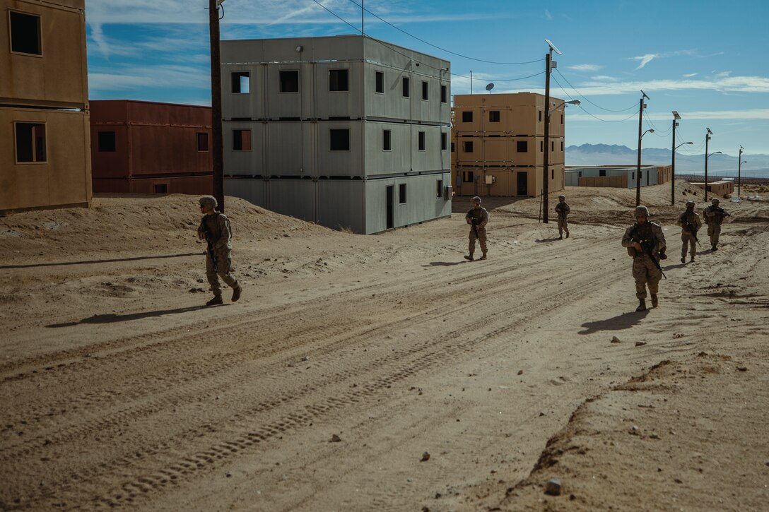 U.S. Marines and U.S. Navy Sailors conduct patrolling during Integrated Training Exercise (ITX) 2-21 on Marine Corps Air Ground Combat Center Twentynine Palms, California, Feb. 03, 2021. Marines and Sailors with Combat Logistics Battalion 6, Combat Logistics Regiment 2, 2nd Marine Logistics Group is training at ITX as the logistics combat element to provide tactical logistics in the areas of medium and heavy-lift motor transportation beyond 6th Marine Regiment's organic capabilities. (U.S. Marine Corps photo by Cpl. Christian M. Garcia)