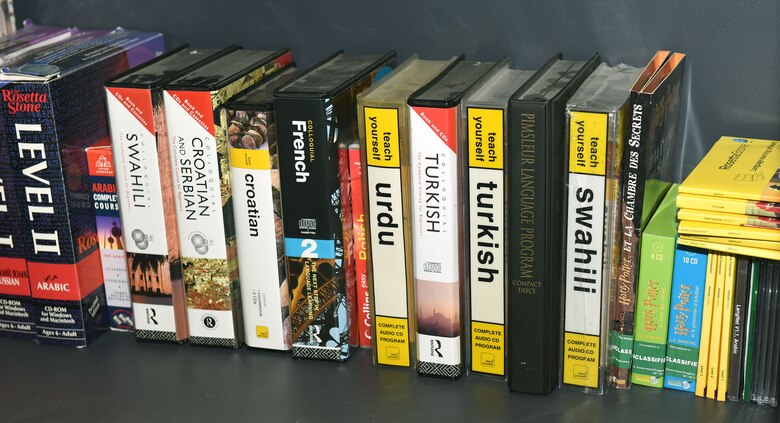 A small selection of books at the 488th Intelligence Squadron’s Language Learning Center shows just a sample of the multiple languages that their professional linguists and mentors can assist with at Royal Air Force Mildenhall, England, Feb. 26, 2021. The LLC offers a variety of resources for language and culture including a broad selection of reference materials, subject-matter experts on hand, literary resources and dedicated classrooms. (U.S. Air Force photo by Karen Abeyasekere)